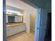 En-suite bathroom features double sinks, granite counters and tile floors at 808 Yauhannah Dr., Little River, SC 29566