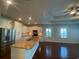 Spacious kitchen features a large center island, stainless steel appliances, and plenty of cabinets at 808 Yauhannah Dr., Little River, SC 29566
