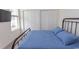 Cozy bedroom with a comfortable bed, plush bedding and a window with blinds at 845 Hall Lane # B, Myrtle Beach, SC 29577