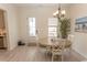 Inviting dining area with stylish decor, natural light, and a seamless flow to the kitchen at 845 Hall Lane # B, Myrtle Beach, SC 29577