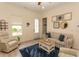 Bright living room with a comfortable seating area, stylish decor, and plank flooring at 845 Hall Lane # B, Myrtle Beach, SC 29577