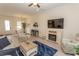 The open living room features a fireplace, comfortable seating, and an adjacent dining area at 845 Hall Lane # B, Myrtle Beach, SC 29577