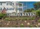 Welcome to Carolina Keyes, featuring beautiful landscaping and an American flag at 901 West Port Dr. # 1611, North Myrtle Beach, SC 29582