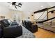 Home theater features multiple leather recliners, a projector and screen, and access to the outdoors at 915 Preservation Circle, Pawleys Island, SC 29585
