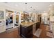 Beautiful kitchen with large island, stainless steel appliances and direct access to an outdoor patio area at 915 Preservation Circle, Pawleys Island, SC 29585