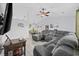 Comfortable living room featuring a large sectional sofa, wood-look flooring, and an open-concept design at 945 Castlewood Dr., Conway, SC 29526
