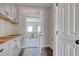 Laundry room with cabinets and entry to the garage at 2212 Old Charleston Rd., Georgetown, SC 29440