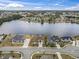 Scenic aerial shot capturing waterfront homes, tranquil lake, and picturesque neighborhood landscape at 1012 Dowitcher Dr., Conway, SC 29526