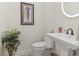 Bathroom features a pedestal sink, modern fixtures, and decorative accents at 1012 Dowitcher Dr., Conway, SC 29526