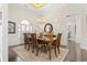 Formal dining room with a chandelier and decorative mirror at 1012 Dowitcher Dr., Conway, SC 29526