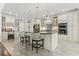 Bright kitchen featuring a central island with seating and modern appliances at 1012 Dowitcher Dr., Conway, SC 29526