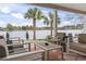 Covered patio overlooking the lake with seating area at 1012 Dowitcher Dr., Conway, SC 29526
