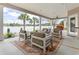 Covered patio overlooking the lake featuring outdoor furniture at 1012 Dowitcher Dr., Conway, SC 29526