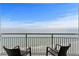 Balcony with ocean views and seating, perfect for relaxing and enjoying the scenery at 107 S Ocean Blvd. # 2106, Myrtle Beach, SC 29577
