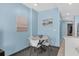 Cozy dining area with modern table set, stylish decor, and light blue walls at 107 S Ocean Blvd. # 2106, Myrtle Beach, SC 29577