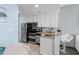 A well-equipped kitchen with stainless steel appliances, custom cabinets and a handy breakfast bar at 107 S Ocean Blvd. # 2106, Myrtle Beach, SC 29577