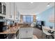 Open floor plan with a modern kitchen featuring granite countertops and views of the ocean at 107 S Ocean Blvd. # 2106, Myrtle Beach, SC 29577