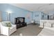 Airy living room featuring a full kitchen, dining area, comfortable seating and a large-screen TV at 107 S Ocean Blvd. # 2106, Myrtle Beach, SC 29577