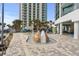 Interactive splash pad featuring a volcano-themed water slide and playful elements in a Gathering-friendly setting at 107 S Ocean Blvd. # 2106, Myrtle Beach, SC 29577