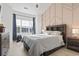Bedroom featuring a large bed and bright window at 110 South Shore Blvd. # 302, Longs, SC 29568