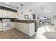 Open kitchen with modern appliances, granite countertops and breakfast bar at 110 South Shore Blvd. # 302, Longs, SC 29568