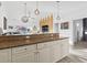 Granite countertops and white cabinets complement the kitchen, seamlessly connecting to the open living space at 110 South Shore Blvd. # 302, Longs, SC 29568