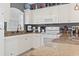 Kitchen with white appliances and granite countertops at 110 South Shore Blvd. # 302, Longs, SC 29568
