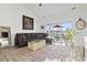 Comfortable living room with plush seating, stylish decor, and access to a patio overlooking serene water views at 110 South Shore Blvd. # 302, Longs, SC 29568