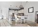 Bright, open layout showcasing a modern kitchen, dining area, and living room, creating a welcoming atmosphere at 110 South Shore Blvd. # 302, Longs, SC 29568