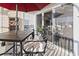 Relaxing patio area with table, chairs, and umbrella, accessible through sliding glass doors at 110 South Shore Blvd. # 302, Longs, SC 29568