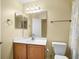 Cozy bathroom with single sink vanity, and decorative mirror at 1205 Woodruff Ct., Conway, SC 29526