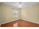 Inviting bedroom with hardwood floors, a ceiling fan and a sunlit window creating a relaxing space at 1205 Woodruff Ct., Conway, SC 29526