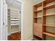 Walk-in closet with custom shelving and drawers offering ample storage at 1205 Woodruff Ct., Conway, SC 29526