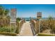 Private beach access with a wooden walkway with access to a beautiful beach at 1207 S Ocean Blvd. # 20206, Myrtle Beach, SC 29577