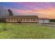 Charming single-story home featuring a spacious yard and detached two-car garage, perfect for country living at 1888 Singing Pines Dr., Conway, SC 29527