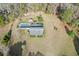 Aerial view of property with mature trees and lush green lawn at 1993 Meadowood Ln., Longs, SC 29568