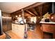 Dining room with hardwood floors, an island, and stainless steel appliances at 1993 Meadowood Ln., Longs, SC 29568