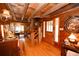 Charming entryway with wooden staircase, hardwood floors, and wooden door at 1993 Meadowood Ln., Longs, SC 29568