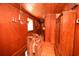 Wood paneled hallway with natural light and rustic decor at 1993 Meadowood Ln., Longs, SC 29568
