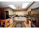 Bright kitchen with skylights, stainless steel appliances, and updated countertops at 1993 Meadowood Ln., Longs, SC 29568