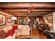 Comfortable living room with wooden beam ceilings, and hardwood floors at 1993 Meadowood Ln., Longs, SC 29568