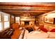 Inviting living room featuring a brick fireplace and lots of natural light at 1993 Meadowood Ln., Longs, SC 29568