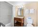 Clean bathroom featuring a shower, vanity, and toilet with neutral color scheme at 2000 N Ocean Blvd. # 1601, Myrtle Beach, SC 29577