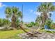 Relaxing hammock in a garden setting offers a peaceful retreat with ocean views at 2000 N Ocean Blvd. # 1601, Myrtle Beach, SC 29577