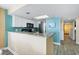 Galley kitchen features granite countertops, stainless steel appliances, and lots of storage space at 2000 N Ocean Blvd. # 1601, Myrtle Beach, SC 29577