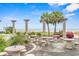 Picturesque outdoor area with chess tables, decorative columns and lush greenery offers a serene relaxation spot at 2000 N Ocean Blvd. # 1601, Myrtle Beach, SC 29577