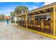Charming poolside bar with seating, perfect for enjoying refreshments in the sun at 2000 N Ocean Blvd. # 1601, Myrtle Beach, SC 29577