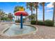 Fun splash fountain with palm tree backdrop and brick paved surface surrounding it at 2000 N Ocean Blvd. # 1601, Myrtle Beach, SC 29577
