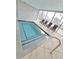 Inviting indoor spa pool with lounging chairs near large windows at 2007 S Ocean Blvd. # 204, Myrtle Beach, SC 29577