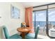Cozy seating area featuring ocean view balcony, table and chairs with quaint decor at 201 74Th Ave. N # 2941, Myrtle Beach, SC 29572